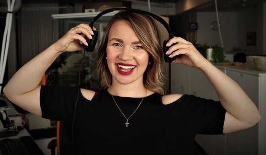 Happy Female podcast host